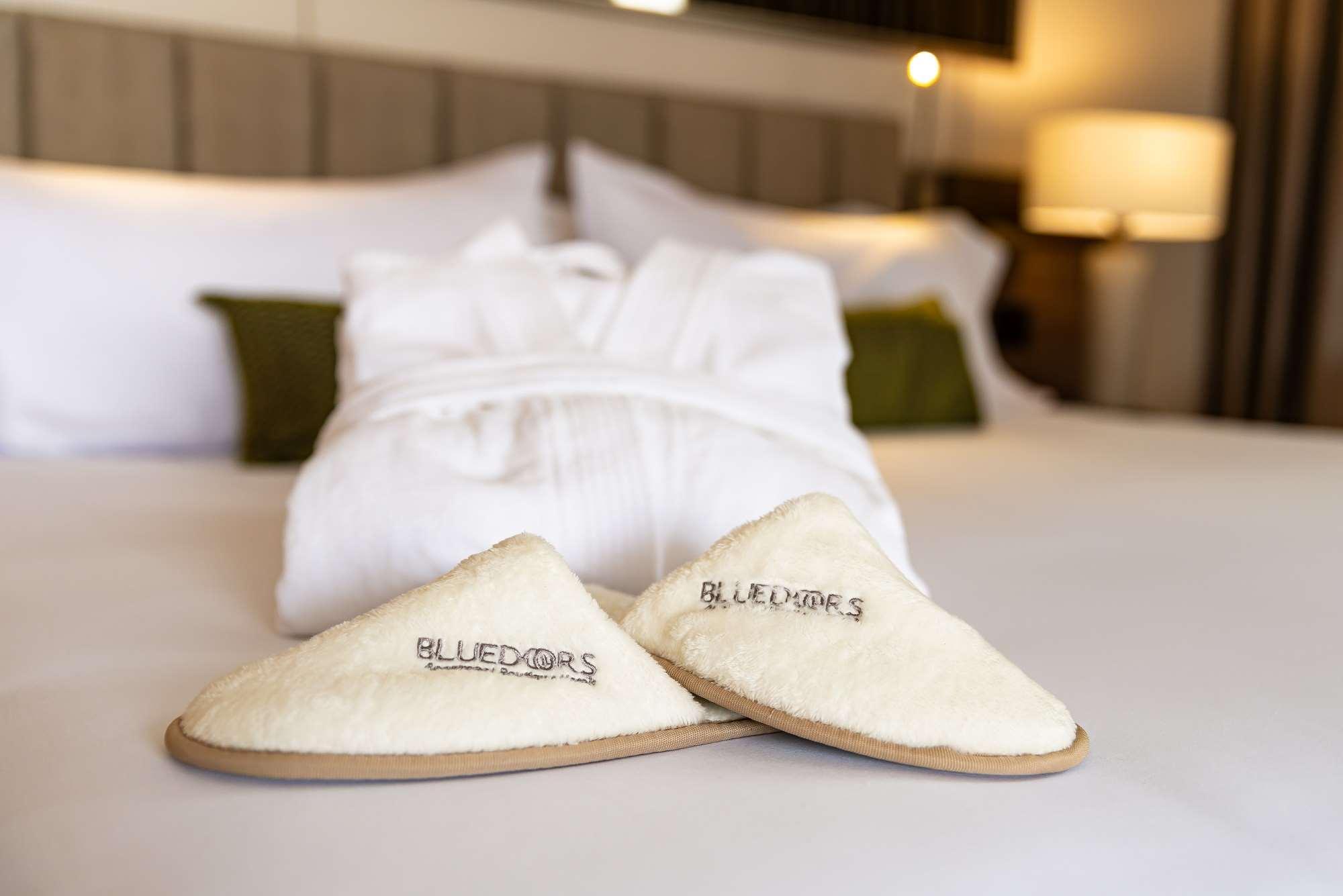 Hotel York Luxury Suites Medellin By Preferred Exteriör bild A pair of hotel slippers
